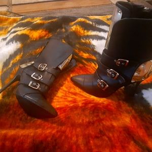 Black pointy heeled boots with gold buckles and side zipper. Size 8.5